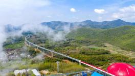 總長13.5公里！空中水泥熟料運(yùn)輸長廊試運(yùn)行！